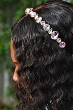 Load image into Gallery viewer, black girl with wavy hair wearing white and pink crystal gemstone headband
